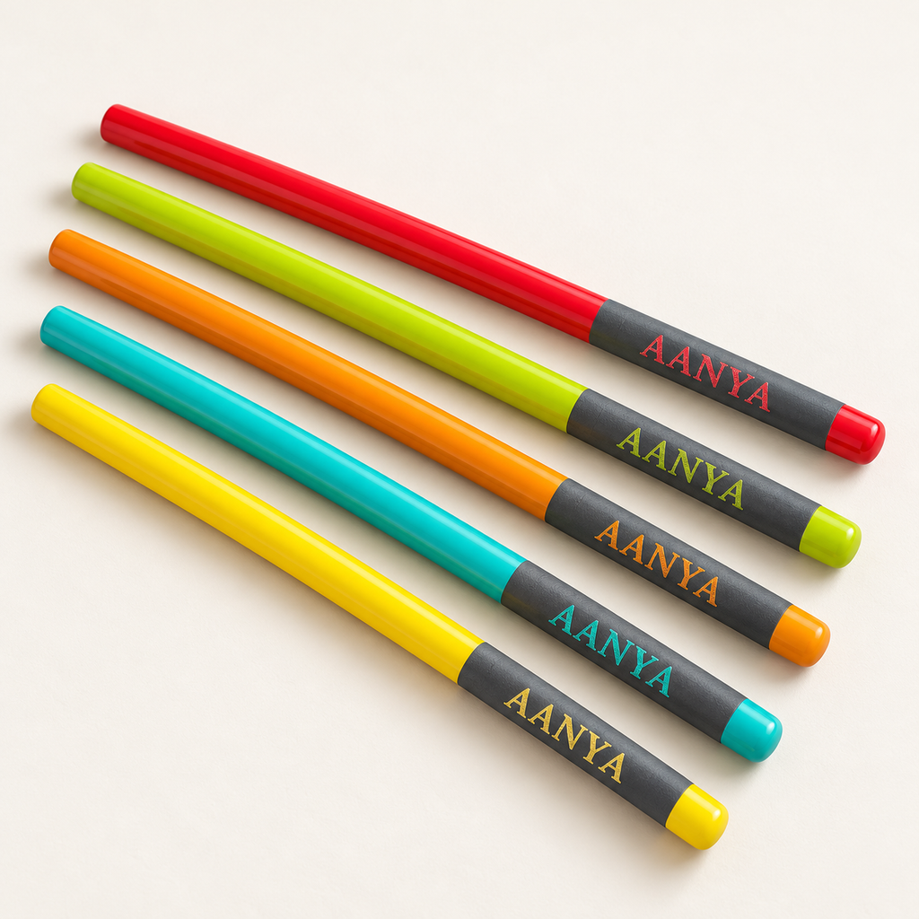 Five colourful personalised pencils with sample name AANYA on a clean background